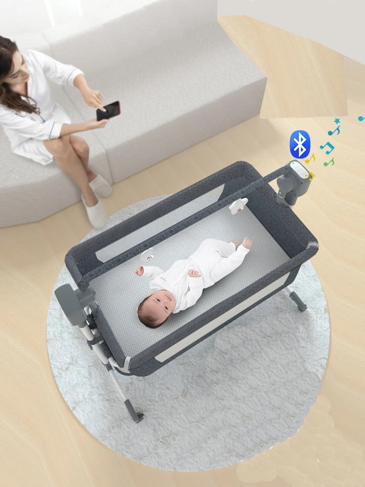 Portable Self-Rocking Bassinet Crib with Mosquito Net & Wireless Bluetooth